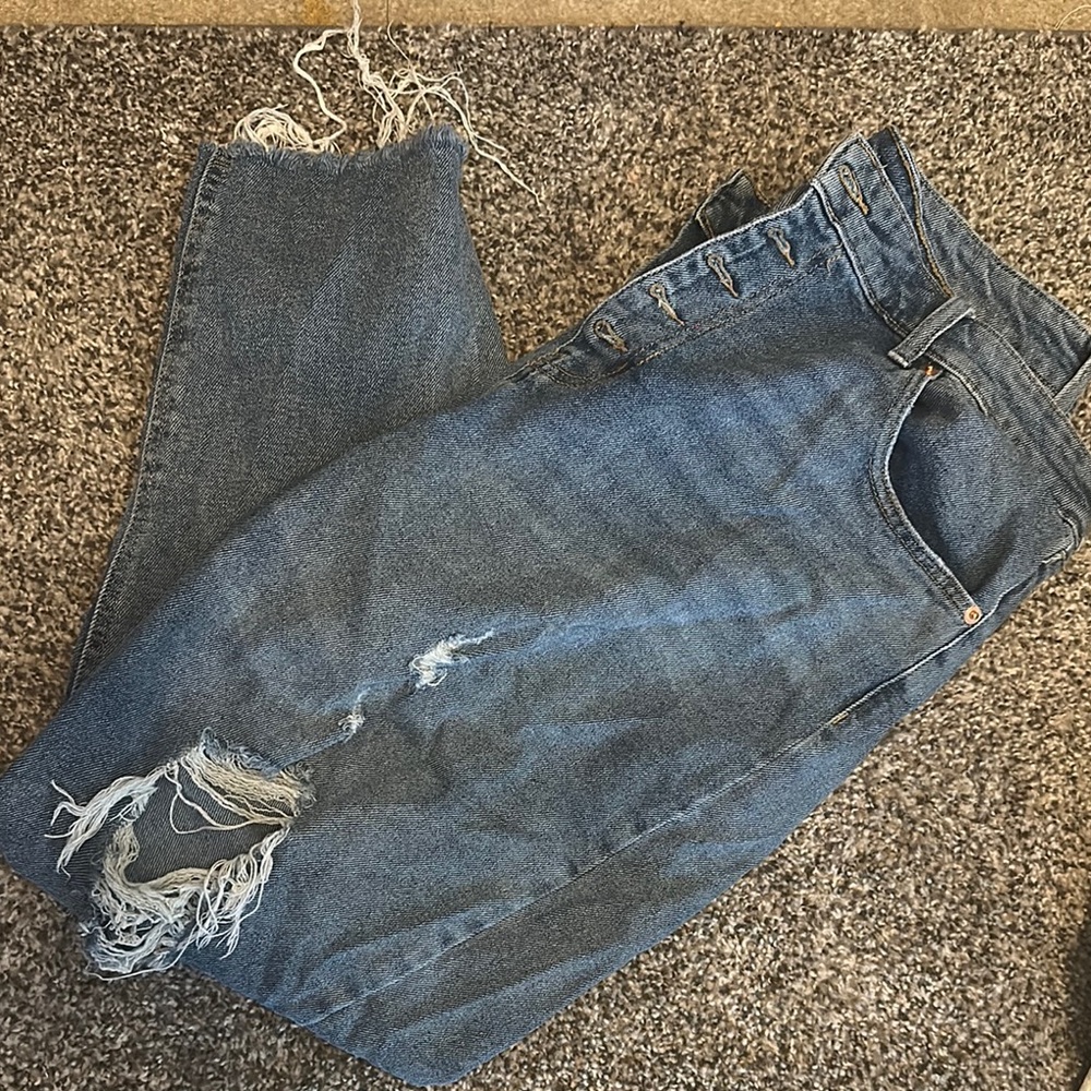 Distressed Blue Denim Jeans